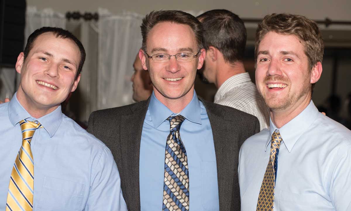 Jim Zwack (center) congratulates 2 Davey employees that graduated from the Davey Institute of Tree Sciences 4-week long training session in February 2014.